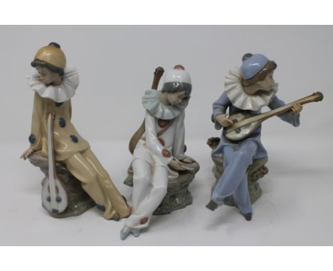 Three Nao figures - Seated clowns with mandolins  CONDITION REPORT: Yellow clown's mandolin has become detached at some point