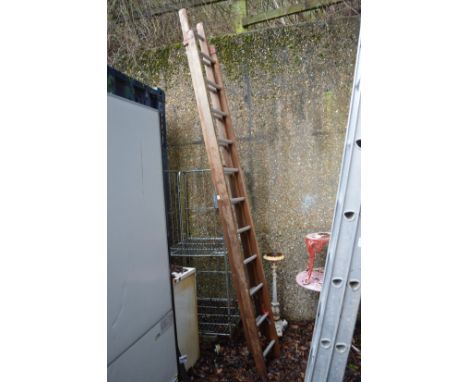 A wooden two section ladder.