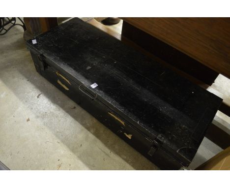 A tin trunk.