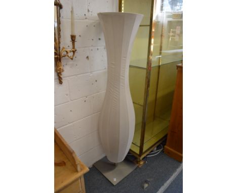 An unusual large cotton covered floor standing lamp.