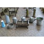 A galvanized watering cans, buckets etc.