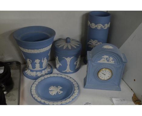 A group of blue jasperware items to include a mantle clock, vases etc.