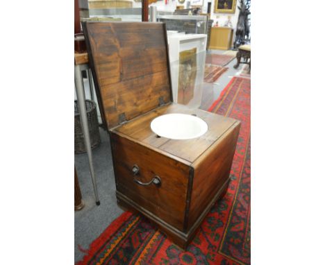 A pine box commode.