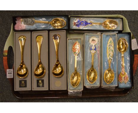 Nine Georg Jensen and other silver gilt and enamel presentation spoons, late 1960's and early 1970's.