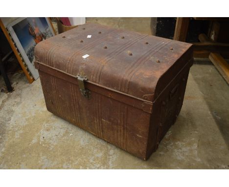 A tin trunk containing various further tin trunks and boxes.