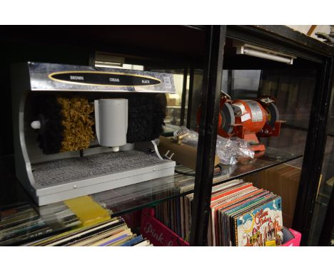 An electric shoe polishing machine, bench grinder and a wall light.
