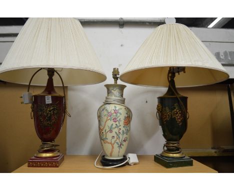 Two Toleware style urn shaped table lamps and a Chinese style lamp.