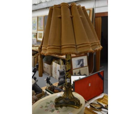 An ornate table lamp.