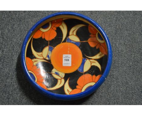 A Clarice Cliff Bizarre circular bowl (broken and restored).