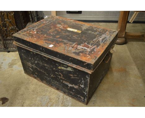 A tin trunk containing various old Persian and other carpets etc (sold as seen).