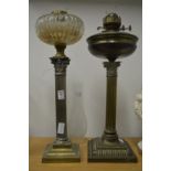 Two corinthian column oil lamp bases.