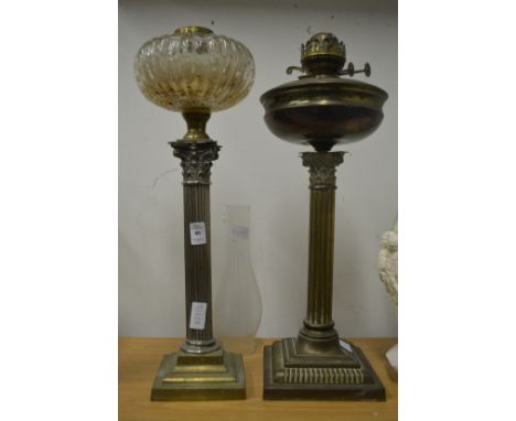 Two corinthian column oil lamp bases.