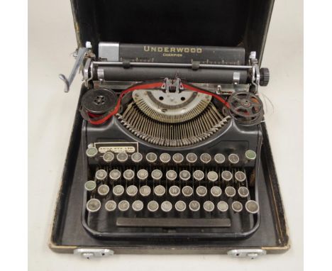 1903's Underwood Champion portable Typewriter in case.