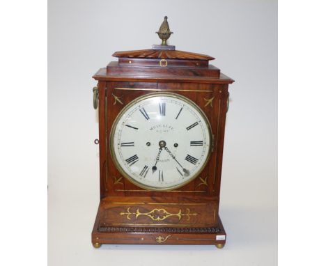 Regency rosewood bracket clock with fusee movement, striking on a bell. Brass inlay. Dial marked Metcalfe, Oxford St. London.