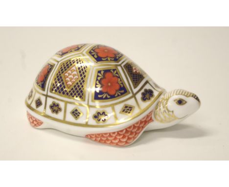 Royal Worcester tortoise form paperweight marked to base, with gold button, (length 12cm approx).