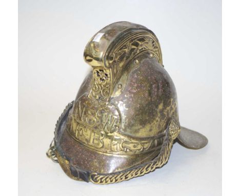 NSW Fire Brigade brass helmet helmet, (worn finish), including chin piece, and internal lining, marked 'NSWFB.'