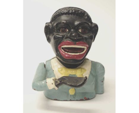 Vintage 'Jolly' Black Man cast metal money box with painted blue jacket, marked verso, (height 17cm approx). These items are 