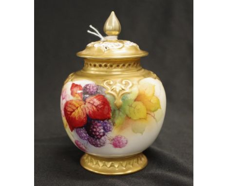Royal Worcester hand painted pot pourri jar hand painted leaf and berry decoration, signed Kitty BLAKE, with gilded and pierc