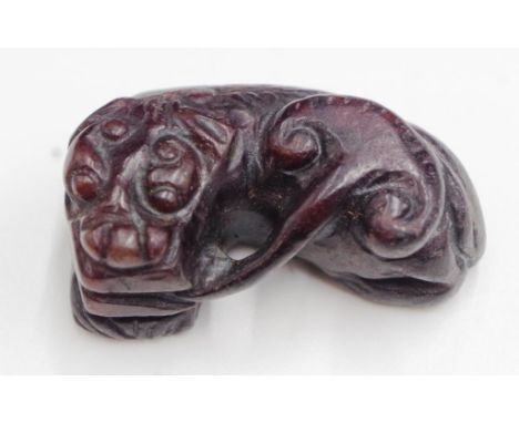 Japanese carved stone dragon netsuke width approx 4cm, height 1.5cm