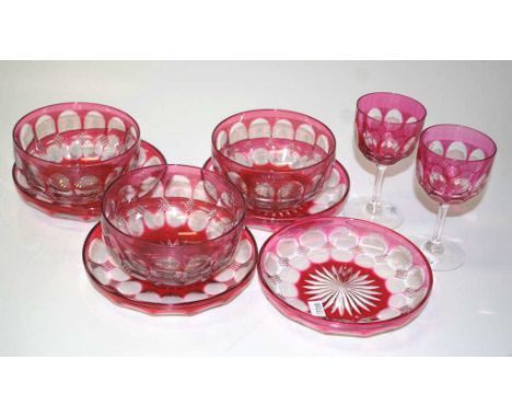 Nine Bohemian ruby flash cut glass table wares comprising 3 bowls, 4 shallow bowls, and 2 stemmed glasses