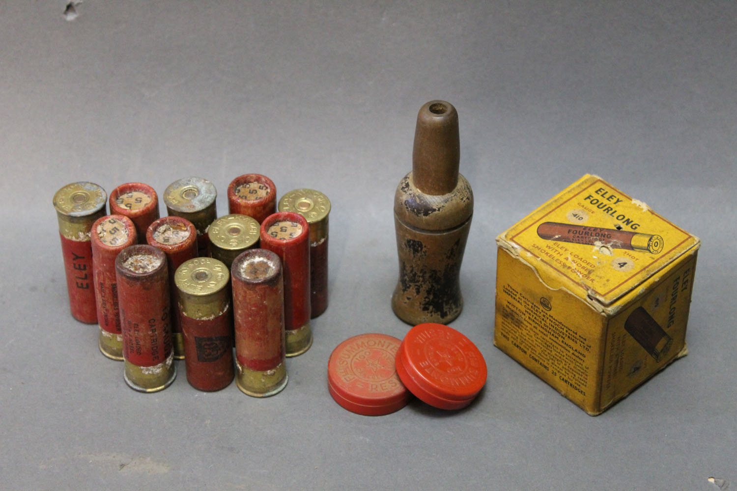 12 Eley paper cased 10 bore cartridges, 2 7/8", box of 25 Eley Fourlong