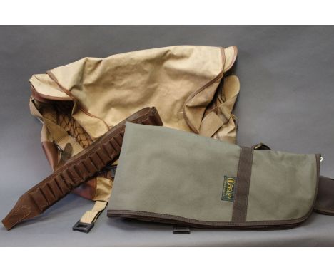 A Bisley rifle slip, suitable for rifle with scope, 12 bore cartridge belt and a large game bag. 