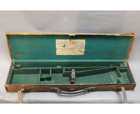 William Atkinson Lancaster &amp; Kendal a canvas and leather trimmed gun case, opening to a green baize lined interior with t