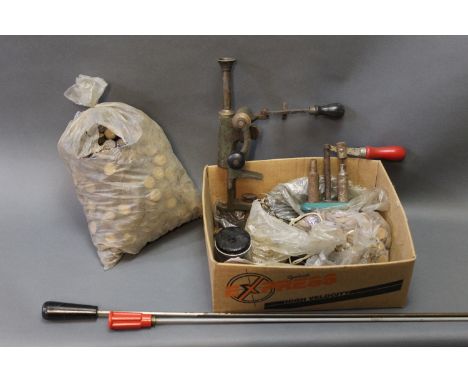 A box of shotgun reloading tools, wads, rifle cleaning rods, etc. 