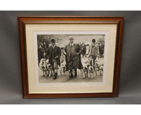 A photographic print of Sir Percy Hope and a young Barry Todhunter with the Blencathra Foxhounds, 35 cm x 45 cm, framed and m