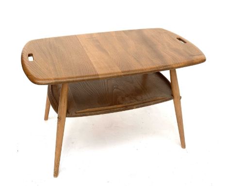 An Ercol light elm two tier occasional table, the top with inset carrying handles, on turned splay legs. Height 44cm, length 
