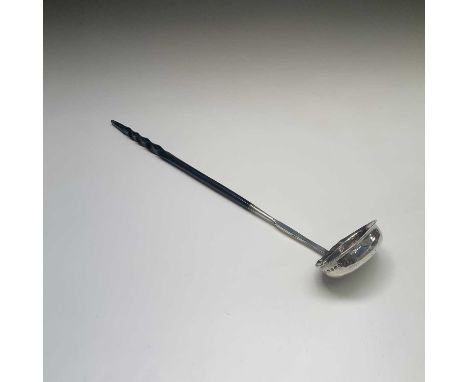 A George III silver punch ladle by Elizabeth Morley the plain oval bowl with silver tipped spiral twist baleen handle. London