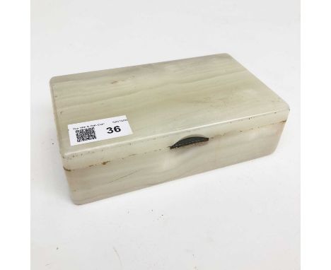 A Betjemann's patent onyx cigarette/trinket box, the hallmarked silver hinge inscribed 'BETJEMANNS PATENT NO. 449335 MADE IN 