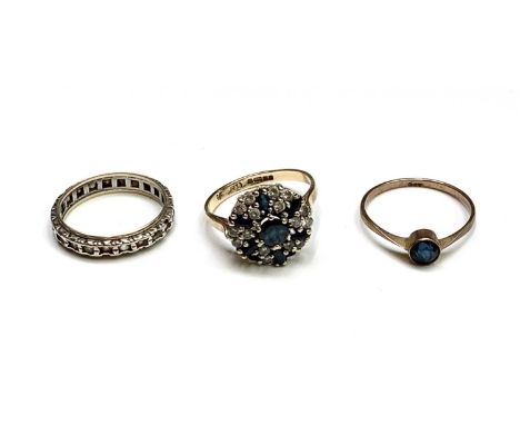 A 9ct gold cluster ring and two other gold rings