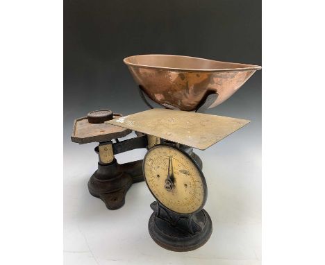 A set of iron large grocer's weighing scales, with shaped copper pan, height 42cm, with two weights by Siddons of West Bromwi