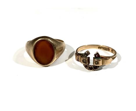 A 9ct gold signet ring set carnelian and a gold horseshoe ring