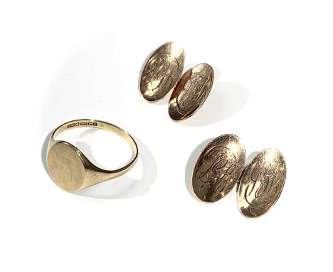 A pair of 9ct gold cufflinks and a 9ct gold signet ring 7.9gm