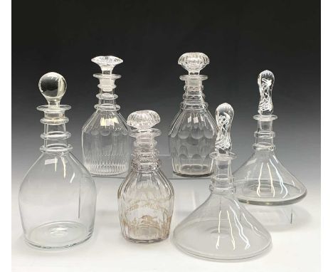 A magnum decanter, height 33cm, a pair of Edwardian triple ring necked decanters and one other, and a pair of ship's decanter