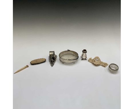 A carved bone bracelet, a gilt pencil an Australian EPNS kangaroo napkin ring by Stewart Dawson etc.