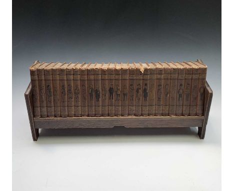 'Punch Library of Humour' - 25 volume set - with oak book shelf. Width of shelf 64cm. 
