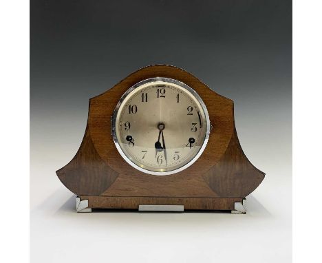 An Art Deco walnut veneered mantel clock, with Westminster or Whittington chimes, on chrome feet, width 35cm.