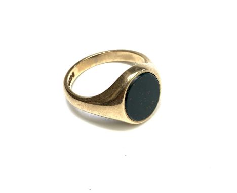 A 9ct gold signet ring set with bloodstone 5.8gmCondition report: The ring is a large 'S' in size. Generally in good conditio