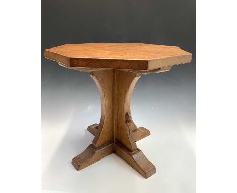 A Robert Thompson of Kilburn "Mouseman" oak occasional table, with octagonal top on cruciform support with carved mouse signa