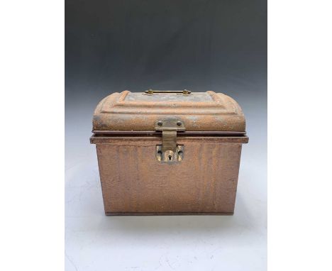 A late Victorian small tin trunk, with domed top, painted decoration and brass clasp, width 29cm.