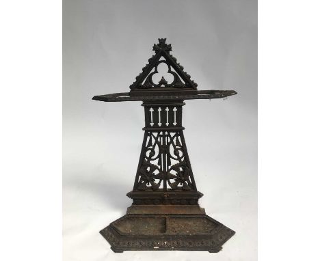 A 19th century Aesthetic movement cast iron stick stand, in the style of Dr Christopher Dresser, with pierced and cast decora