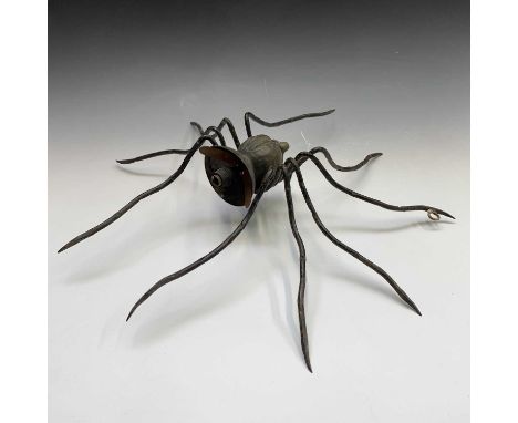 An Italian copper and wrought iron light fitting in the form of a spider, with hammered body, total height 51cm.