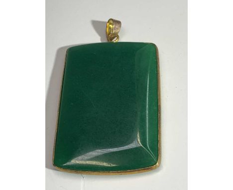 A jade pendant 55 x 37mm