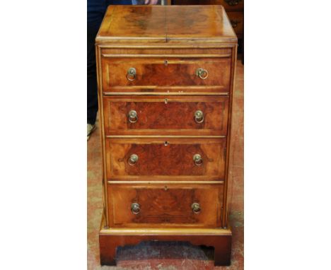 1920s figured walnut washstand, the top with twin hinged leaves over four drawers, on bracket feet, 94cm high. Condition Repo