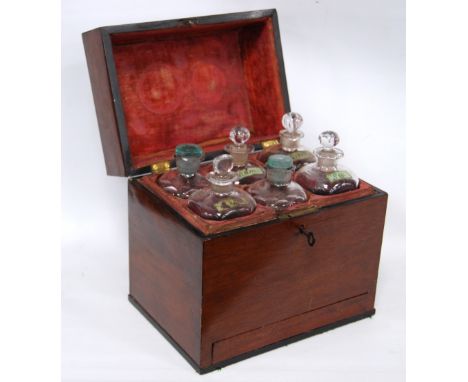 George III mahogany decanter box fitted with six labelled bottles, 26cm high and 22.5cm wide.