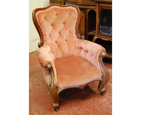 Victorian mahogany button-back armchair with pink upholstery, on cabriole legs, 107cm high.