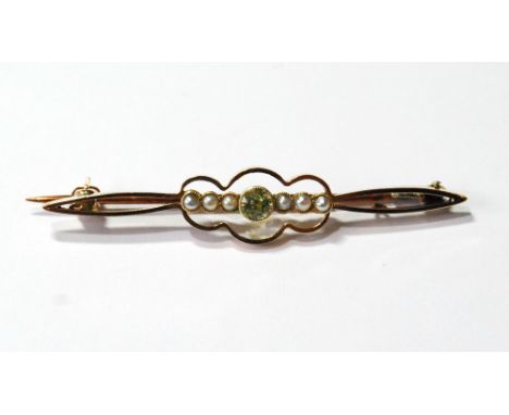 Gold bar brooch with pearl and peridot openwork centre.